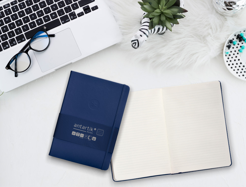 CARNET A5 ANTARTIK NOTES LIGNECOUVERTURE RIGIDE FERMETURE   ELASTIQUE 100 PAGES 80GR      COLORIS BLEU MARINE