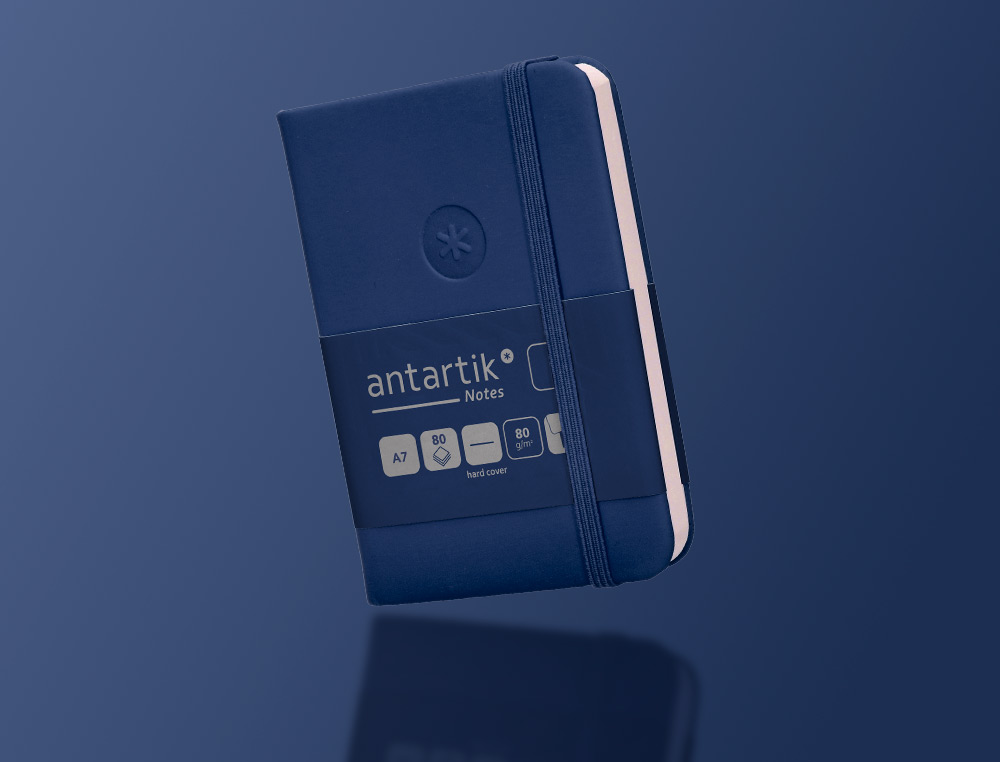 CARNET A7 ANTARTIK NOTES PAPIER UNI IVOIRE COUVERTURE RIGIDE FERMETURE ELASTIQUE 80 PAGES 80GR COLORIS BLEU MARINE