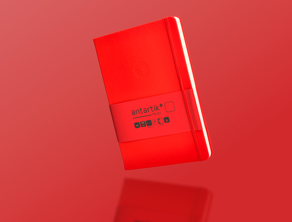 CARNET A5 ANTARTIK NOTES PAPIER UNI IVOIRE COUVERTURE  RIGIDE FERMETURE ELASTIQUE 100PAGES 80GR COLORIS ROUGE