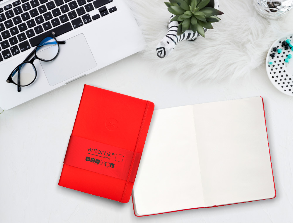 CARNET A5 ANTARTIK NOTES PAPIER UNI IVOIRE COUVERTURE  RIGIDE FERMETURE ELASTIQUE 100PAGES 80GR COLORIS ROUGE