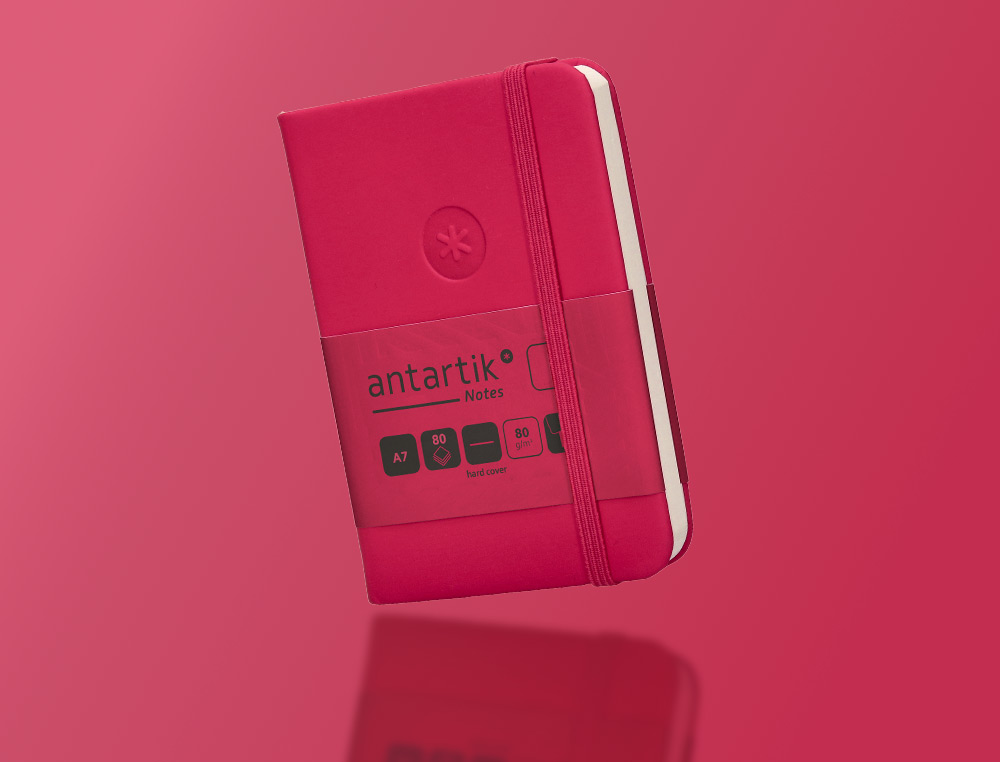 CARNET A7 ANTARTIK NOTES PAPIER UNI IVOIRE COUVERTURE RIGIDE FERMETURE ELASTIQUE 80 PAGES 80GR COLORIS FRAMBOISE
