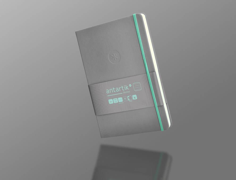 CARNET A5 ANTARTIK NOTES LIGNECOUVERTURE RIGIDE FERMETURE ELASTIQUE TURQUOISE 100 PAGES 80GR COLORIS GRIS