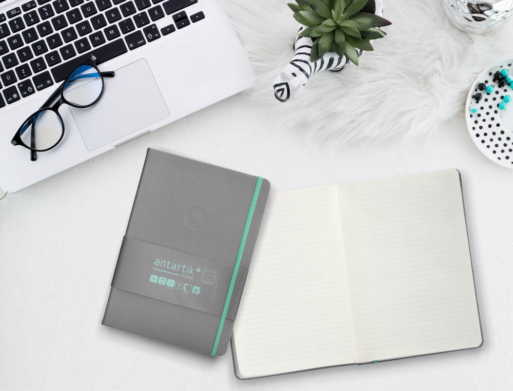 CARNET A5 ANTARTIK NOTES LIGNECOUVERTURE RIGIDE FERMETURE ELASTIQUE TURQUOISE 100 PAGES 80GR COLORIS GRIS