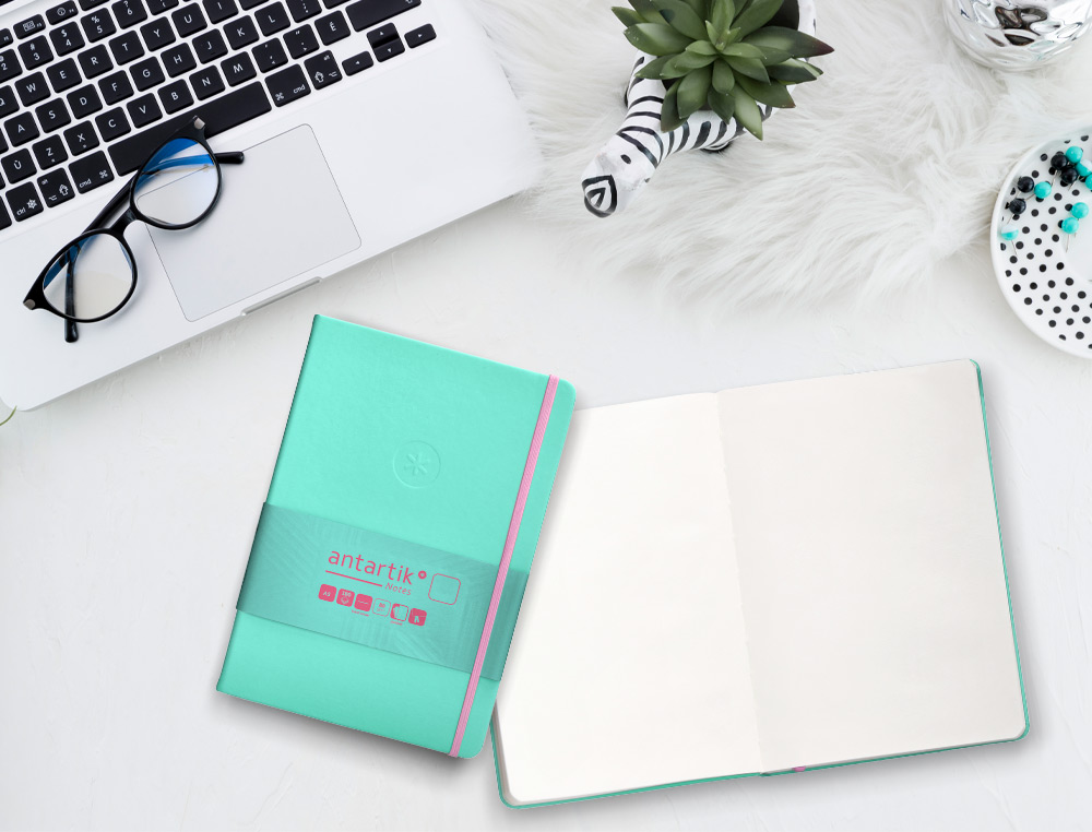 CARNET A5 ANTARTIK NOTES PAPIER UNI IVOIRE COUVERTURE RIGIDE FERMETURE ELASTIQUE ROSE 100 PAGES 80GR COLORIS TURQUOISE