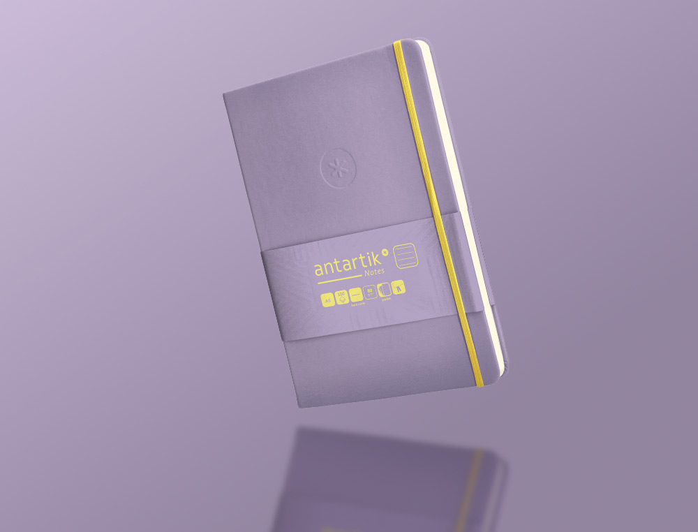 CARNET A5 ANTARTIK NOTES LIGNECOUVERTURE RIGIDE FERMETURE ELASTIQUE JAUNE 100 PAGES 80GRCOLORIS LILAS