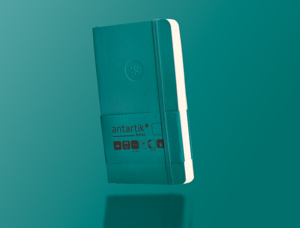 CARNET A6 ANTARTIK NOTES PAPIER UNI IVOIRE COUVERTURE  SOUPLE FERMETURE ELASTIQUE 100PAGES 80GR COLORIS VERT PAON